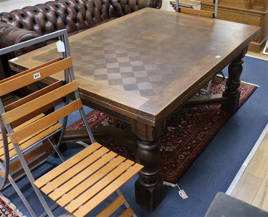 An oak draw leaf table W.150cm